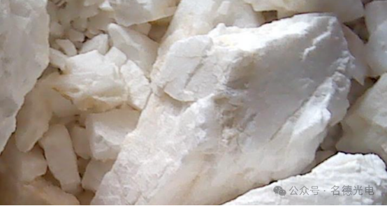 What are the differences between the properties and separation processes of barite and witherite?